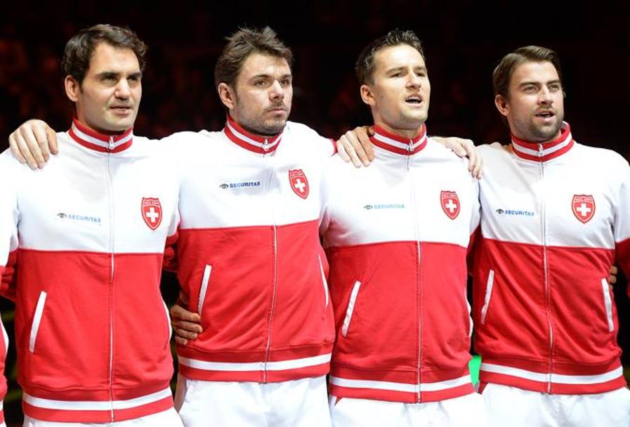 Da sinistra: Roger Federer, Stanislas Wawrinka, Marco Chiudinelli e Michael Lammer. AFP